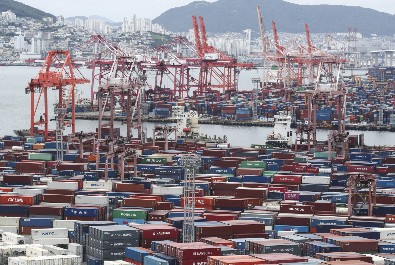 This file photo taken Aug. 11, 2022, shows stacks of containers at a port in South Korea's southeastern city of Busan. (Yonhap)