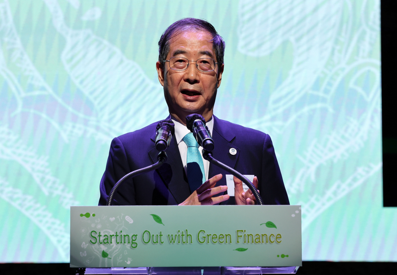 Prime Minister Han Duck-soo speaks at an international conference in Seoul on Wednesday. (Yonhap)