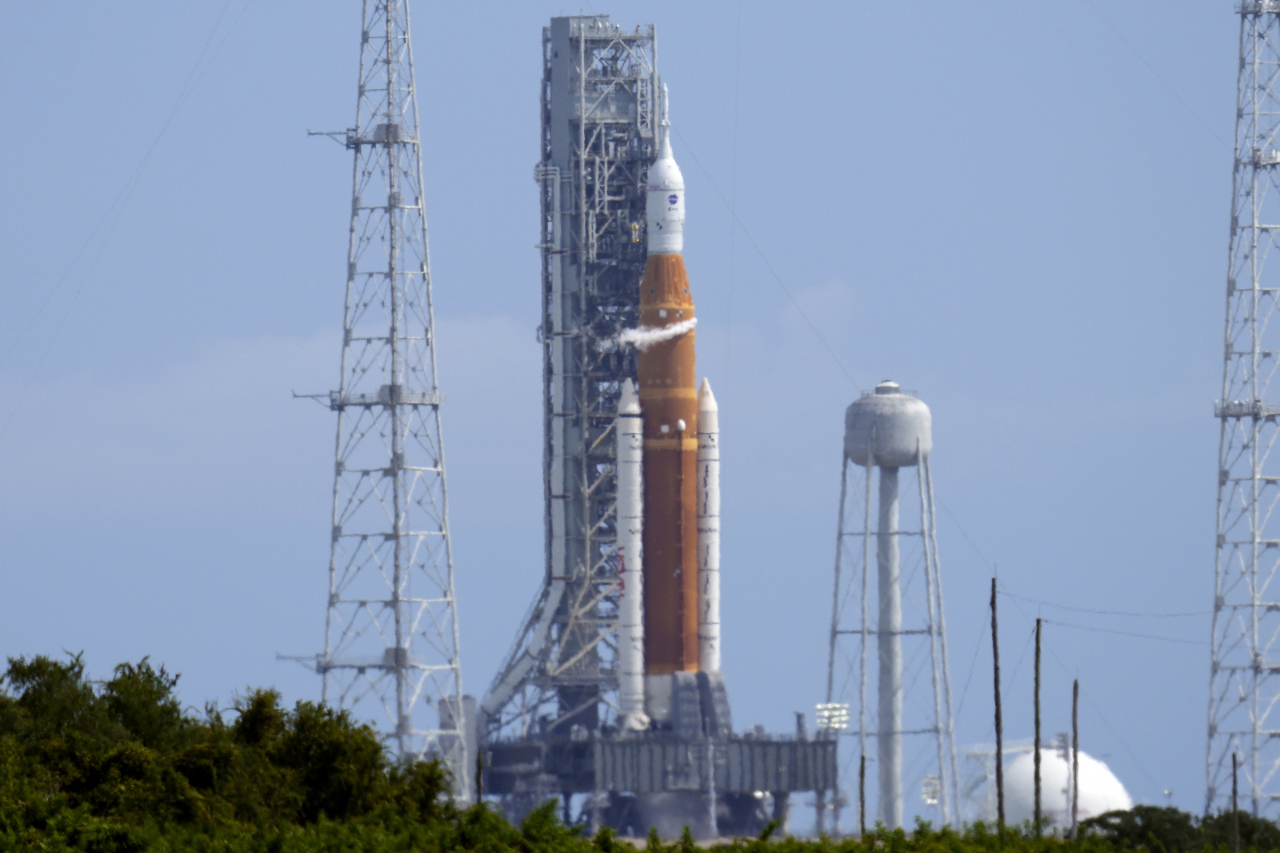 NASA's new moon rocket sits on Launch Pad 39-B moments after the launch attampt was scrubbed at the Kennedy Space Center Saturday, Sept. 3, 2022, in Cape Canaveral, Fla. (AP Photo/Chris O'Meara)