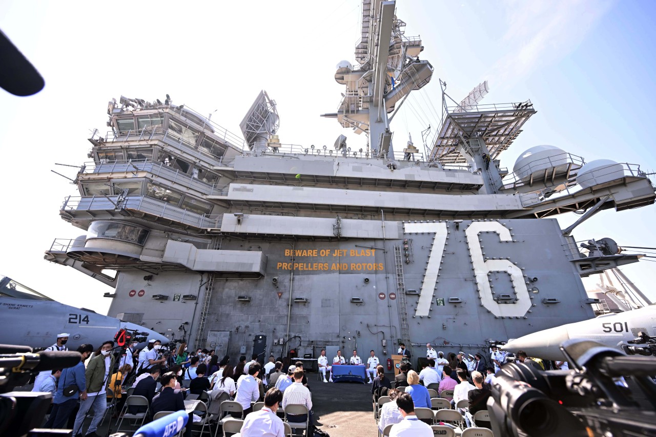South Korean and US naval commanders hold a news conference at the naval operations headquarters in Busan, southeastern South Korea, on Sept. 23, 2022, on the USS aircraft carrier Ronald Reagan's entry into a naval base in the South Korean port city earlier in the day, From left are U.S. Naval Forces Korea Rear Adm. Mark Schafer, the Ronald Reagan's Captain Fred Goldhammer and Commander Rear Adm. Michael Donnelly and South Korea's Rear Adm. Kim Kyung-cheol. The nuclear-powered aircraft carrier entered the country for its first combined drills with the South Korean Navy in five years. (Yonhap)