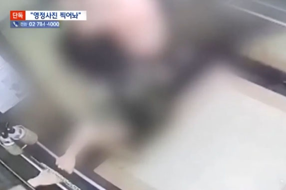 지난 5월 15일 새벽 경기도 파주의 한 군인아파트에서 현역 군인이 도망치던 전 부인을 쫓아가 끌고오는 모습. [MBC 방송화면 캡처]