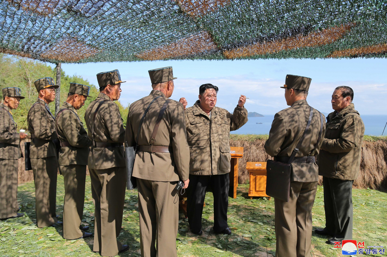 This photo, released by the Korean Central News Agency (KCNA) on Monday, shows North Korean leader Kim Jong-un overseeing his military's major training. The agency reported that Kim inspected an exercise of tactical nuclear operation units to assess the "war deterrent and nuclear counterattack capabilities" in response to recent joint drills by South Korea and the United States. (KCNA)