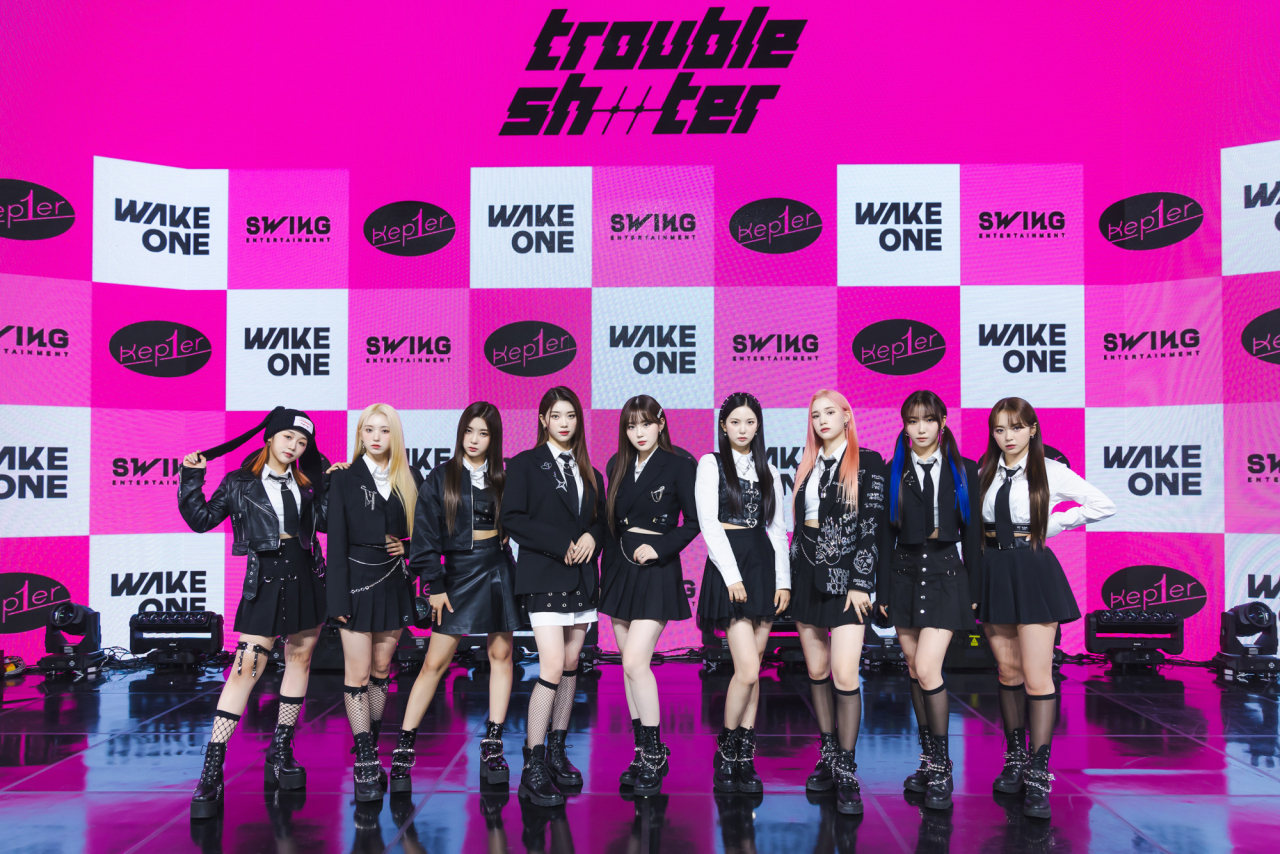 Kep1er poses during a press conference for “Troubleshooter,” in Seoul on Thursday. (Wake One and Swing Entertainment)