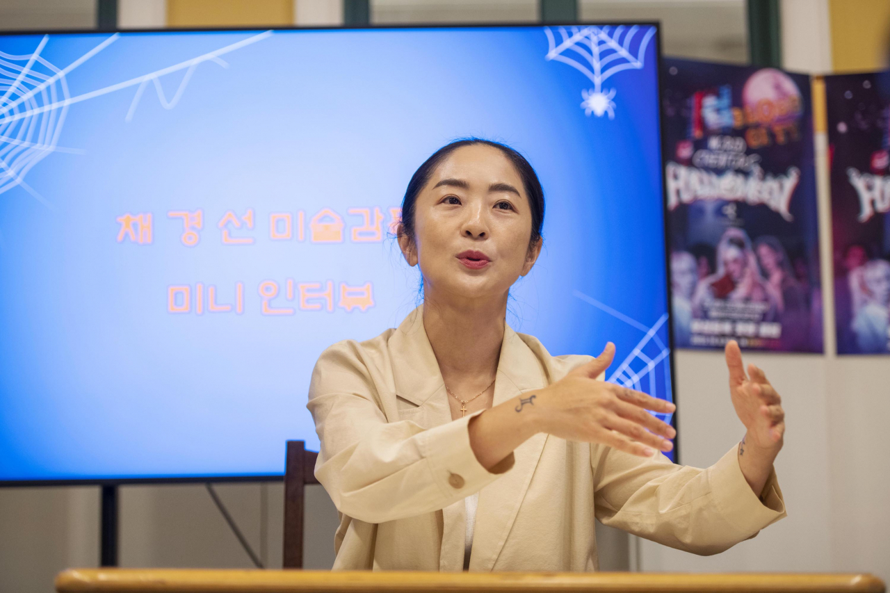 Art director Chae Gyung-seon explains the concept of this year's "Blood City" to reporters at a press conference on Sept. 28. (Everland Resort)