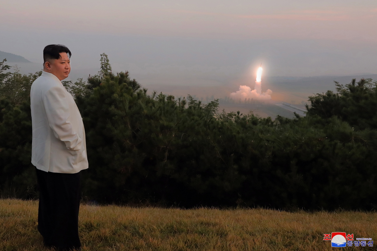 An undated photo released on 10 October 2022 by the official North Korean Central News Agency (KCNA) shows North Korean Supreme Leader Kim Jong-un overseeing a military drill carried out to check and assess the war deterrent and nuclear counterattack capability of the country, amid ongoing joint military exersizes involving US and South Korean forces in the waters near the Korean Penninsula. (Yonhap)