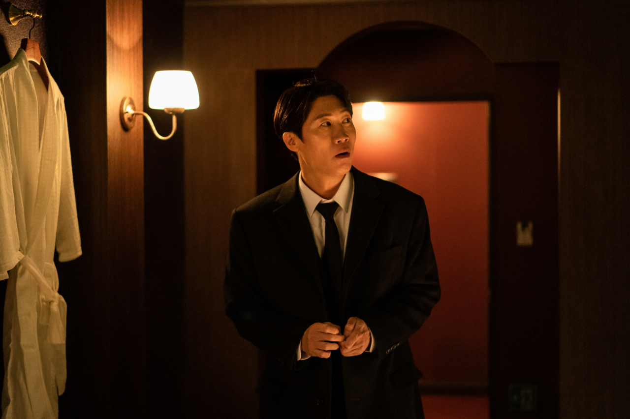 Jin Seon-kyu plays a middle-aged man who haggles on the price for sex in "Bargain." (Tving)