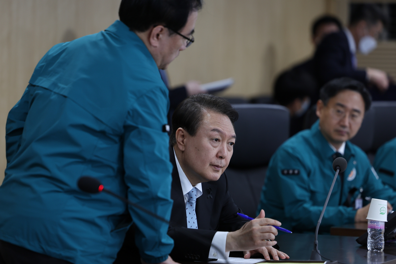 President Yoon Suk-yeol presides over an emergency National Security Council meeting at the presidential office in Seoul on Wednesday. (Yonhap)