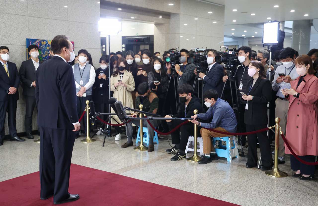 President Yoon Suk-yeol speaks to reporters as he arrives at the presidential office in Seoul on Thursday. (Yonhap)