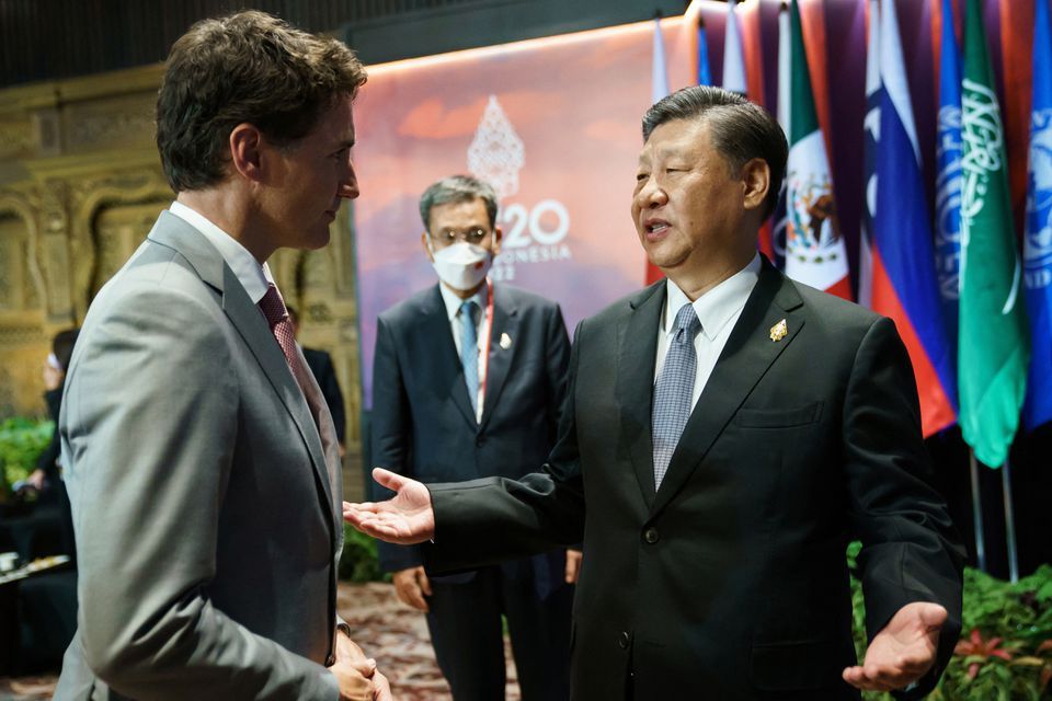 Canada's Prime Minister Justin Trudeau speaks with China's President Xi Jinping at the G20 Leaders' Summit in Bali, Indonesia, November 16, 2022. Adam Scotti/Prime Minister's Office/Handout via REUTERS.