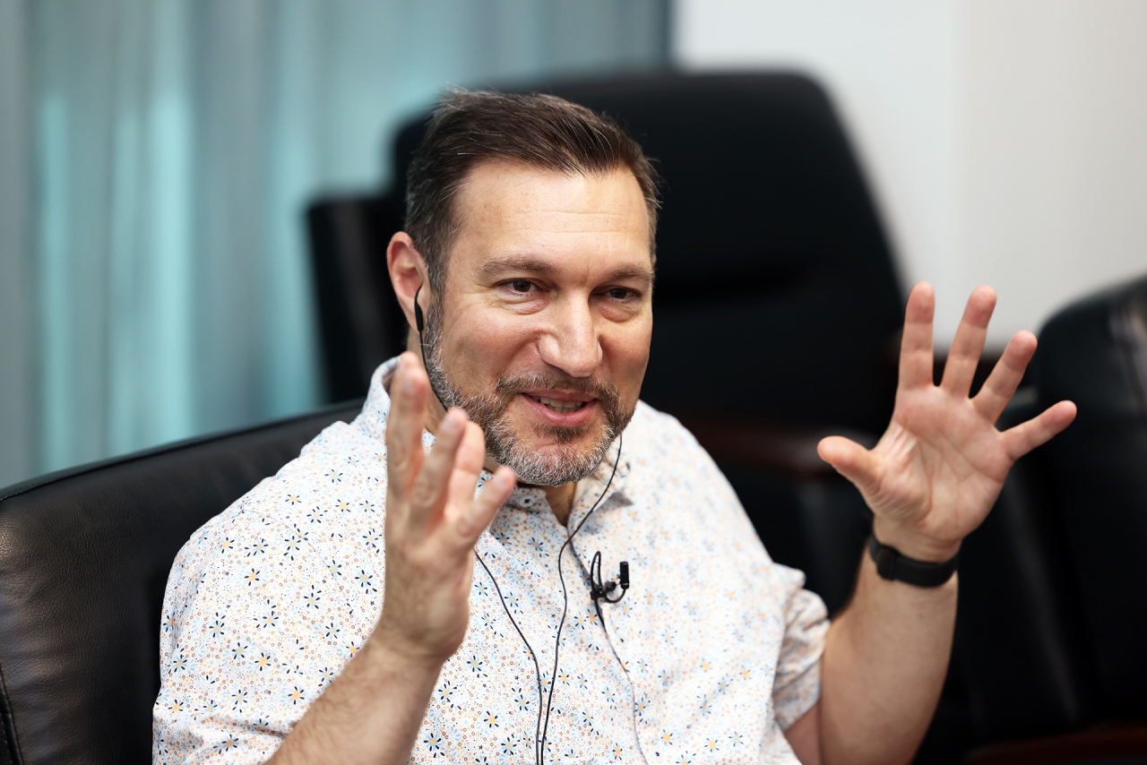 Steve Papoutsis, chief development officer at Striking Distance Studios, speaks to reporters in a group interview at G-Star in Busan on Thursday. (Krafton)