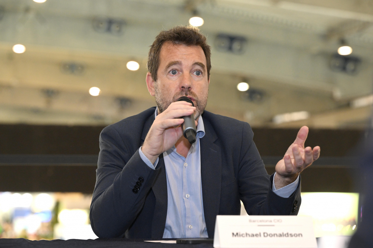 Michael Donaldson, the Barcelona City Council Chief Technology Officer and CIO, speaks during an interview at the Seoul pavilion, installed as part of Smart City Expo World Congress 2022, Thursday. (The Seoul Digital Foundation)