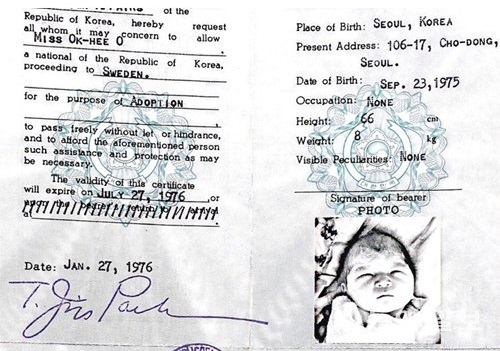 A photograph shows Karin Jensen‘s original Korean passport issued when she was adopted by a Swedish couple. (Courtesy of Jensen)