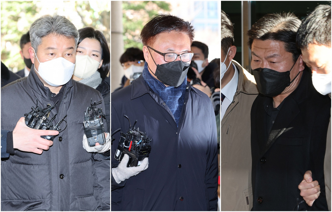 이태원 참사 부실대응과 정보보고서 삭제 의혹으로 영장이 청구된 경찰 간부 4명의 구속 전 피의자 심문(영장실질심사)이 5일 오후 서울서부지법에서 열렸다. 왼쪽부터 김진호 전 용산서 정보과장, 박성민 전 서울경찰청 공공안녕정보외사부장(경무관), 이임재 전 용산경찰서장(총경). [연합]