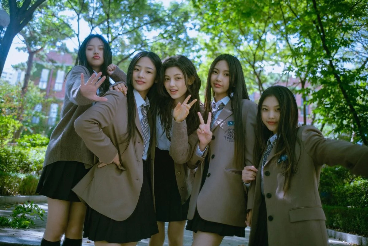 NewJeans ADOR K-pop girl group promotional photo for Ditto pre-release single that topped Korean local music charts including Melon Bugs Genie Flo becoming a Y2K plugg lo-fi study soundtrack for global students
