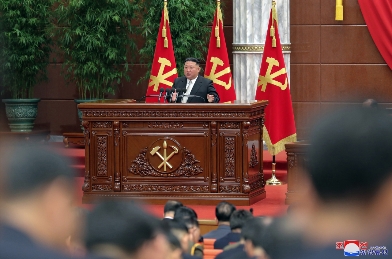 This photo, carried by North Korea's official Korean Central News Agency on Jan. 1, 2023, shows North Korean leader Kim Jong-un speaking at a plenary meeting of the ruling Workers' Party of Korea, raising the need to exponentially increase the number of its nuclear arsenal. (Yonhap)