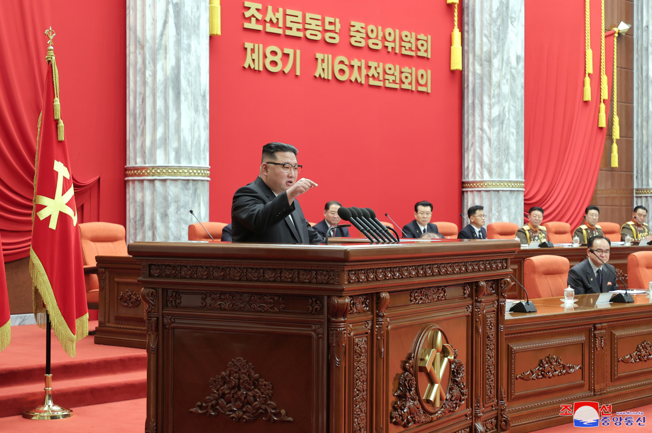 This photo, carried by North Korea's official Korean Central News Agency on Jan. 1, 2023, shows North Korean leader Kim Jong-un speaking at a plenary meeting of the ruling Workers` Party of Korea, raising the need to exponentially increase the number of its nuclear arsenal. (Yonhap)