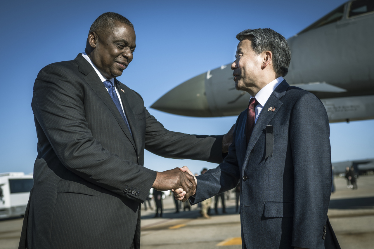 Secretary of Defense Lloyd Austin III thanks Republic of Korea Minister of National Defense Lee Jong-Sup at the conclusion bilateral meetings, a wreath laying at the Koream War Veterans Memorial and tour of two U.S. Air Force bomber aircraft -- a B-52 Stratofortress and a B-1 Lancer at Joint Base Andrews, Md., Nov. 3, 2022. (Photo - US Department of Defense)