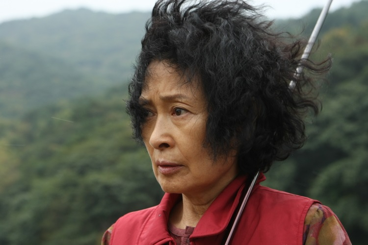 Kim Hye-ja plays a widow who is overly protective of her son in Bong Joon-ho‘s 2009 film “Mother.” (CJ Entertainment)