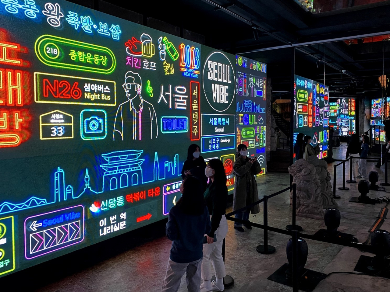 Visitors watch a media show at Gallery Gwanghwa (Design Silverfish)