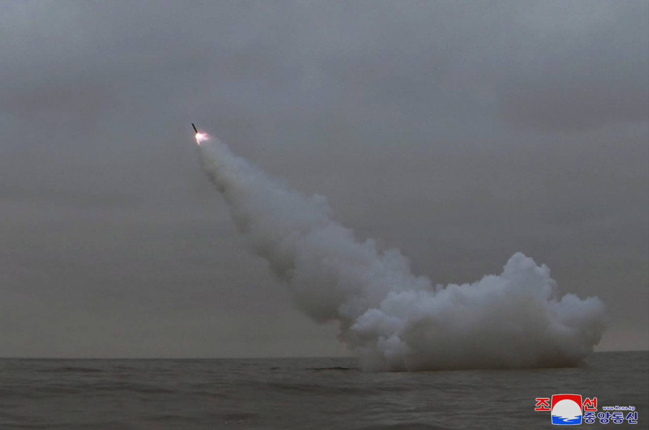 A "strategic cruise missile" is fired from the 8.24 Yonggung submarine of North Korea in the waters of Kyongpho Bay in the East Sea at dawn on March 12, 2023, in this photo released by the North's official Korean Central News Agency (KCNA). The North launched two strategic cruise missiles from the submarine as it conducted an underwater drill on the eve of the Freedom Shield exercise, a regular South Korea-U.S. combined military exercise. (Yonhap)