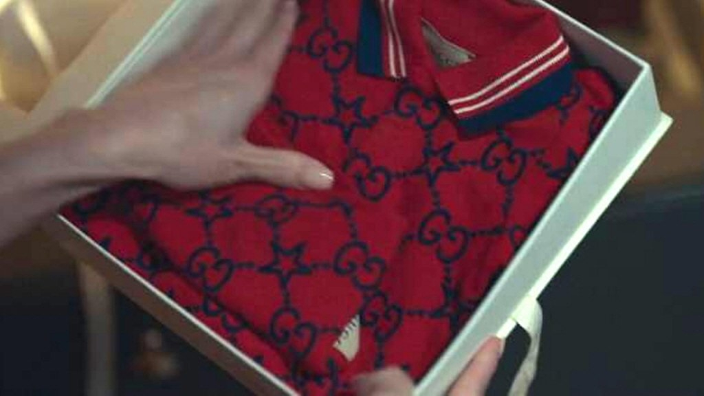 A scene from "The Glory," where a Gucci onesie is featured. (Courtesy of Netflix)