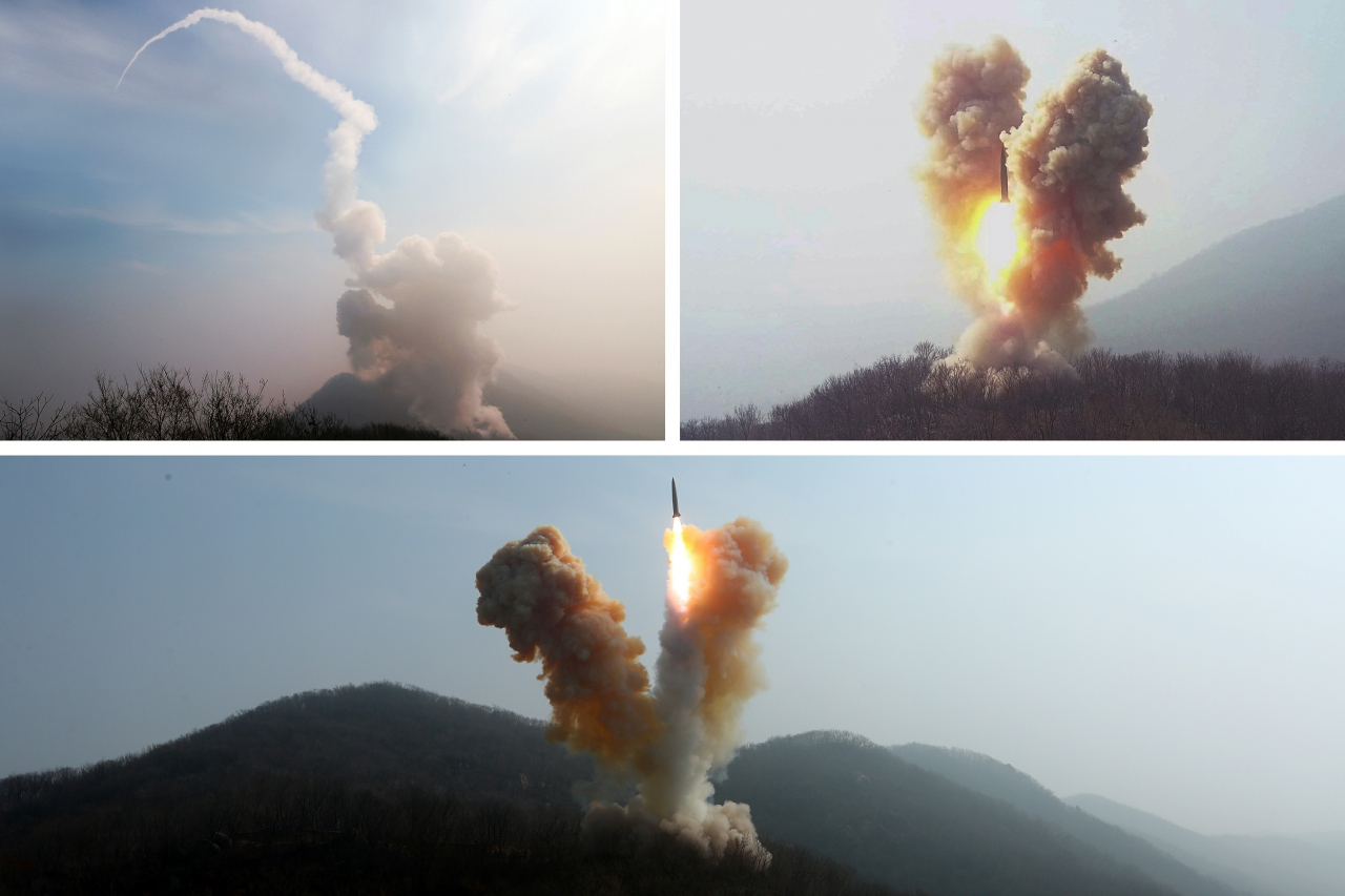 북한이 지난 19일 발사한 KN-23계열 단거리탄도미사일(SRBM)이 사일로(Silo·지하발사대)에서 발사된 것으로 추정되는 가운데 최근 두 달 사이에 관련 시설을 구축했을 것이란 관측이 나온다. KN-23계열 미사일이 발사되는 순간 화염과 연기가 ‘V’자 형태로 솟구치는 모습. [평양 노동신문=뉴스1]