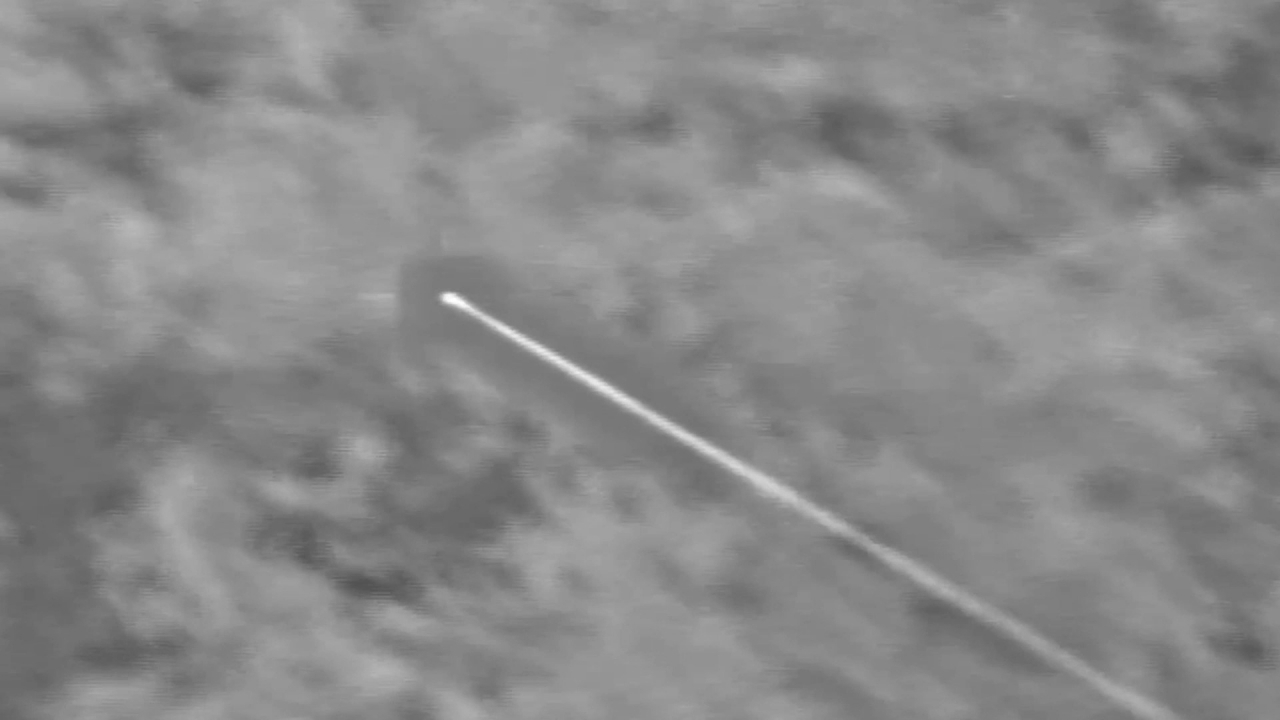 A second-stage booster of South Korea‘s homegrown long-range surface-to-air missile system is ignited and heads toward a target ballistic missile in this photo taken by an infrared camera on Tuesday. (Photo - Agency for Defense Development )