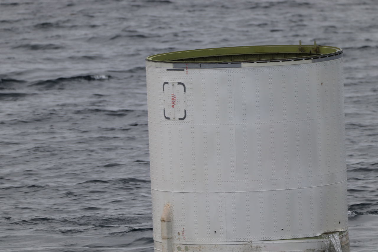 his photo, provided by South Korea's Joint Chiefs of Staff on May 31, 2023, shows an object believed to be part of North Korea's space launch vehicle that was discovered in the Yellow Sea. (Joint Chiefs of Staff)