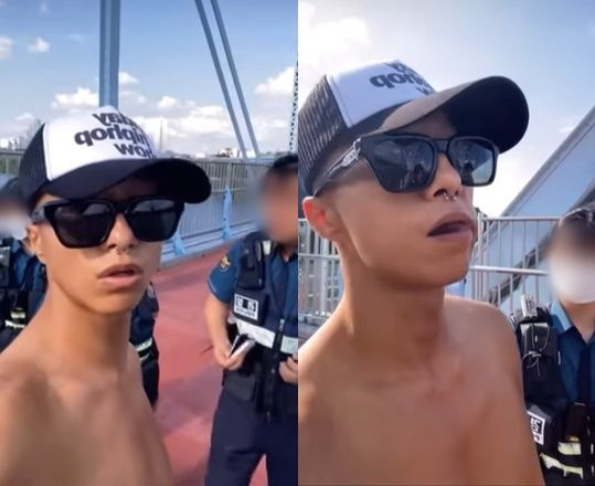 래퍼 빅베이비가 민원을 받고 출동한 경찰로부터 상의를 입어달라는 협조 요청을 받는 모습. [빅벌엔터테인먼트 유튜브]