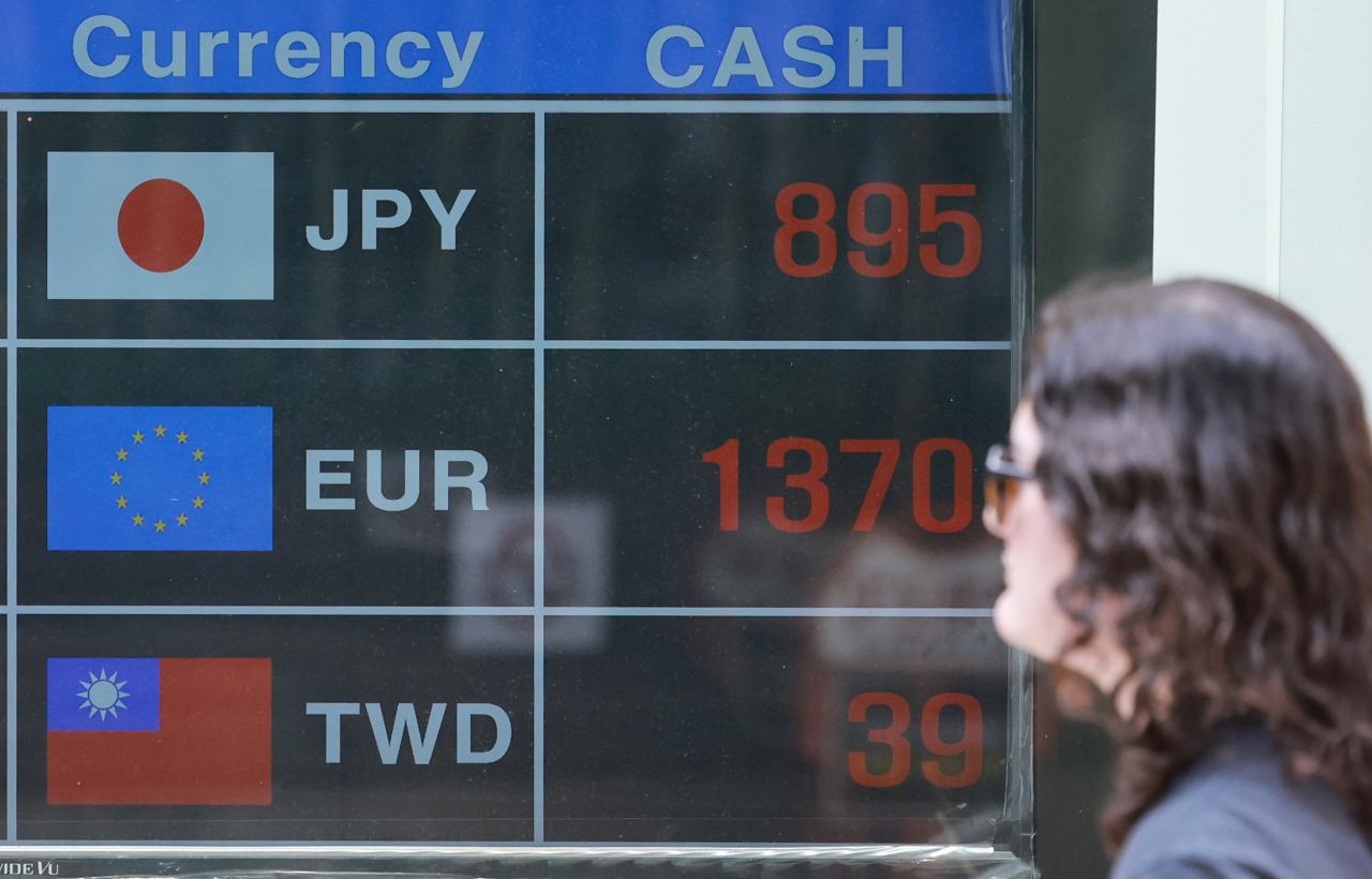 A currency exchange display board in Myeong-dong, central Seoul shows various exchange rates on June 19. (Yonhap)