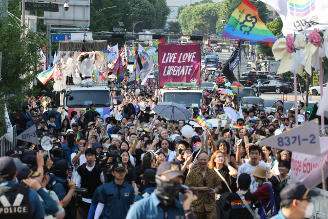 Participants of the 24th Seoul Queer Culture Festival join the Pride parade in Euljiro, Seoul, Saturday. (Yonhap)