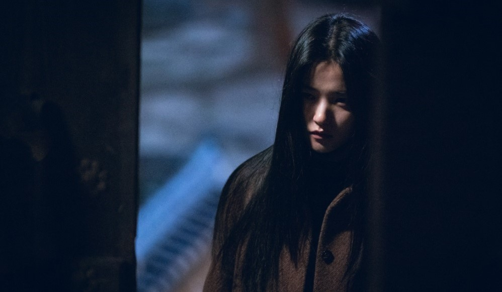 Kim Tae-ri stars as Gu San-yeong, a hard-working woman who is possessed by an evil spirit, in "Revenant" (SBS)