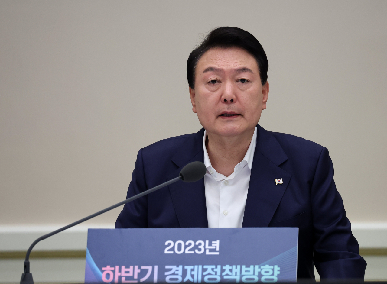 President Yoon Suk Yeol speaks during a government meeting at the former presidential office, Cheong Wa Dae, in Seoul last Tuesday, to discuss economic policy directions for the second half of the year. (Yonhap)
