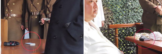 조선중앙통신이 13일 공개한 김정은 북한 국무위원장의 신형 고체연료 대륙간탄도미사일(ICBM )‘‘화성-18형’시험발사시찰 현장에서 ‘폴더블 스마트폰’으로 추정되는 물체가 포착됐다(오른쪽 사진). 왼쪽 사진은 김 위원장이 지난 3월 9일 화성포병부대의 화력습격훈련을 현지지도 한 현장 모습으로 당시엔 흰색 일체형 스마트폰이 포착됐다. [연합]