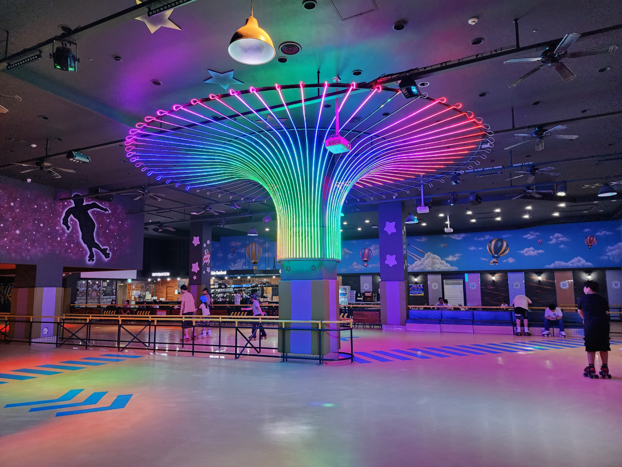 People roller skate at a local roller skate rink in Seoul. (Hwang Dong-hee/The Korea Herald)