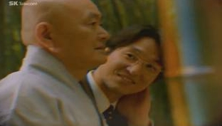 1998년 고인이 배우 한석규와 함께 출연한 CF 장면