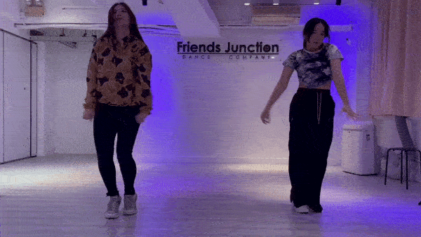 Vivo Fung Lok-yin (left) and Megan Leow Su Lynn dance to Blackpink's "Shut Down" at the Friends Junction Dance Company studio in Hong Kong on March 21. (Naomi Ng/The Korea Herald)