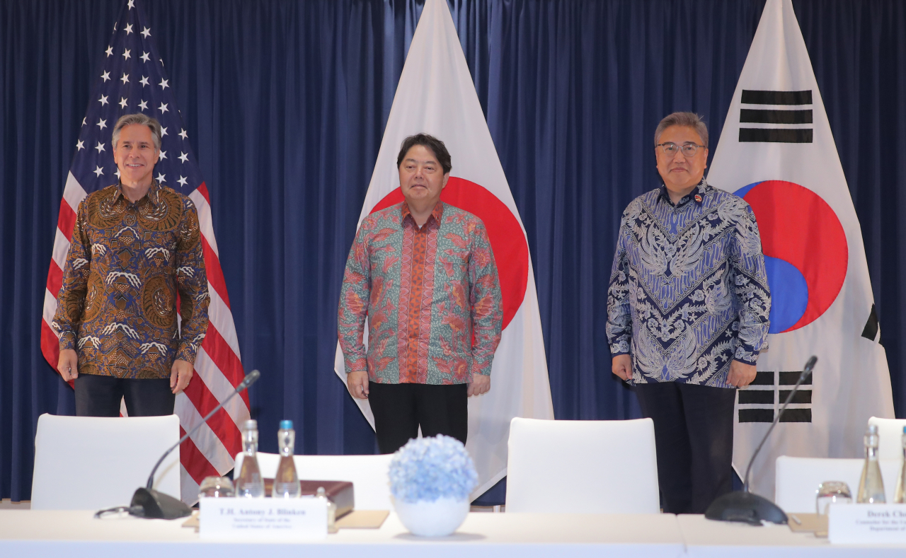 (From left to right) US Secretary of State Antony Blinken, Japanese Foreign Minister Yoshimasa Hayashi and South Korean Foreign Minister Park Jin hold a trilateral meeting in Jakarta on July 14, to discuss measures against North Korea's missile provocations. (Yonhap)