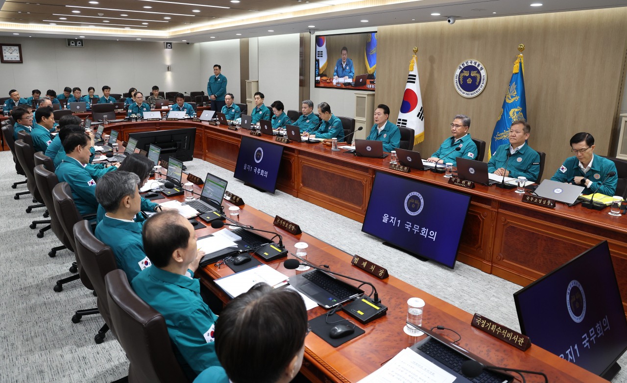 President Yoon Suk Yeol presides over a Cabinet meeting at the presidential office in Seoul on Monday. (Yonhap)