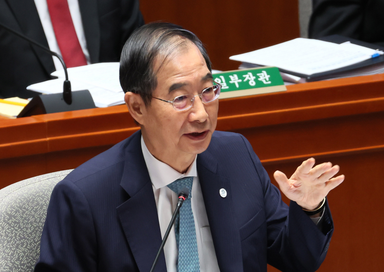 한덕수 국무총리가 30일 국회에서 열린 예산결산특별위원회 전체회의에서 의원 질의에 답변하고 있다. [연합]