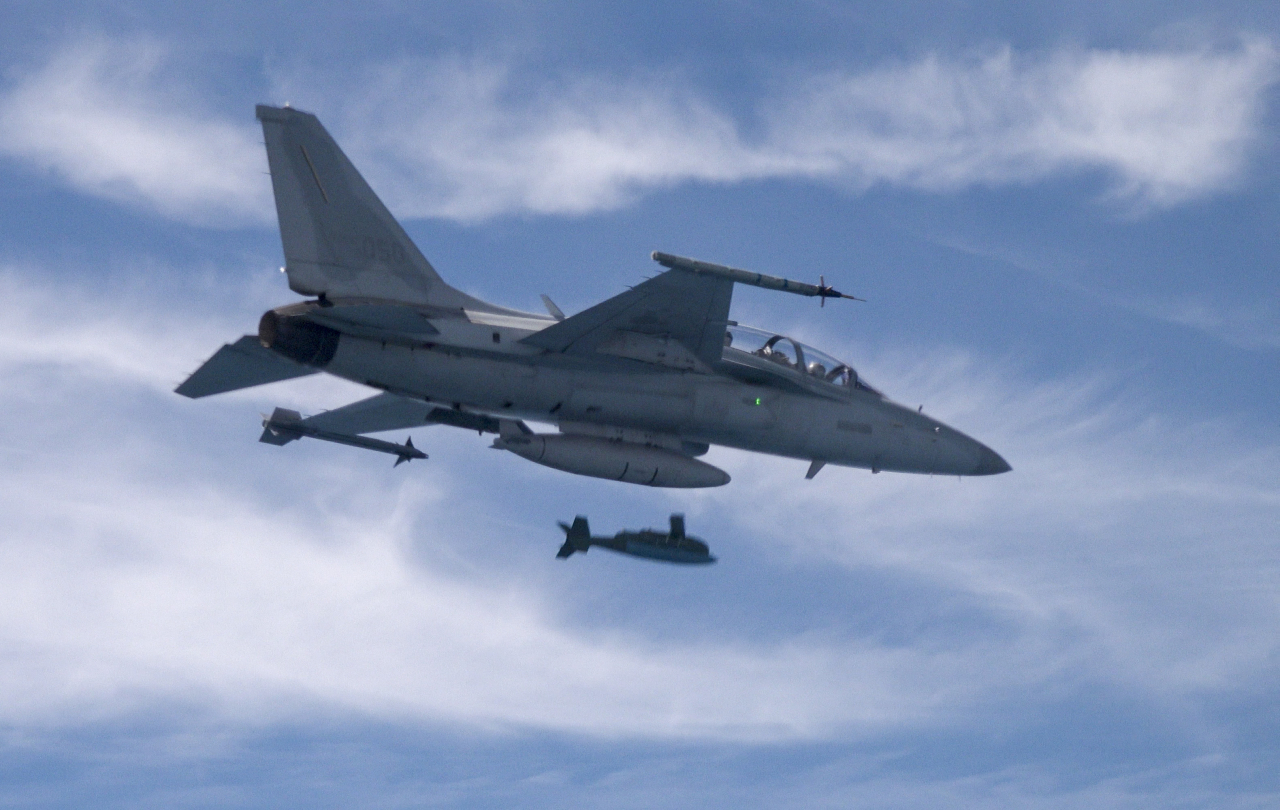 A South Korean F-15K fighter jet fires a GBU-56 air-to-surface missile at a target in the Yellow Sea on Thursday, in this photo provided by the Air Force.