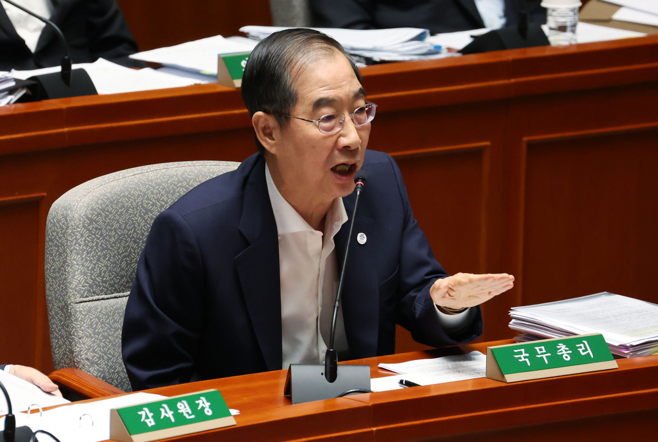 한덕수 국무총리가 31일 국회에서 열린 예산결산특별위원회 전체회의에서 더불어민주당 기동민 의원의 질의에 답하고 있다. [연합]