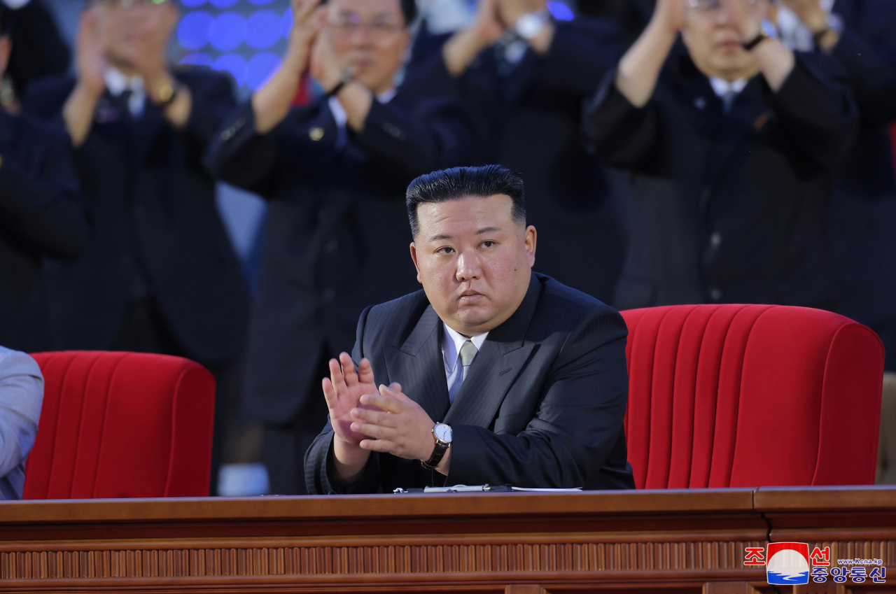 This photo, provided by North Korea's official Korean Central News Agency on Friday, shows North Korean leader Kim Jong-un attending a central party meeting to mark the 75th anniversary of the North Korean government's foundation on Friday. (Yonhap)
