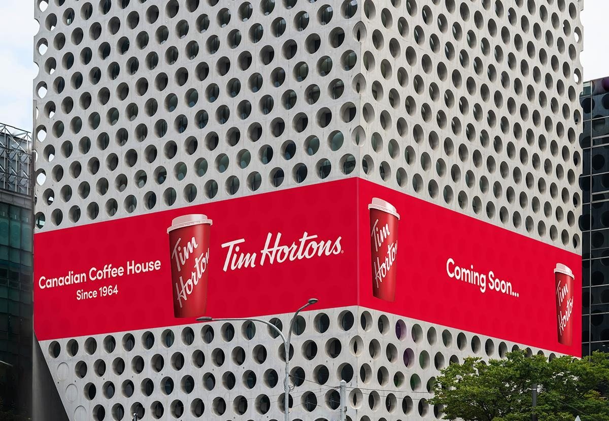 A banner advertising that the Canadian coffee chain's first shop in South Korea will open soon at the Urban Hive building in Seoul's southern Gangnam district. (Yonhap)