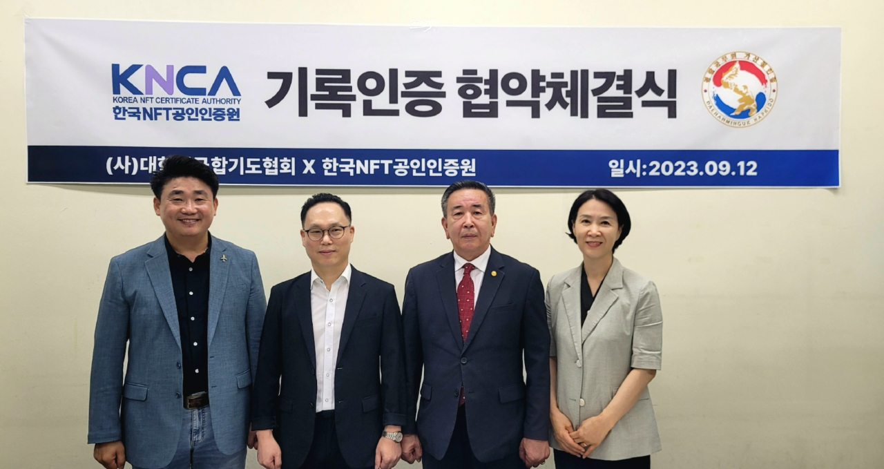 사진 왼쪽부터 강광민 한국NFT공인인증원 부원장, 김승일 한국NFT공인인증원 원장, 정명채 대한민국합기도협회 총재, 오정미 한국NFT공인인증원 본부장.