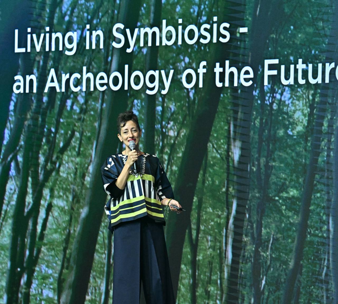 Lina Ghotmeh delivers a presentation titled "Living in Symbiosis -- an Archaeology of the Future" at the Herald Design Forum 2023 on Tuesday at the Shilla Seoul. (Im Se-jun/The Korea Herald)