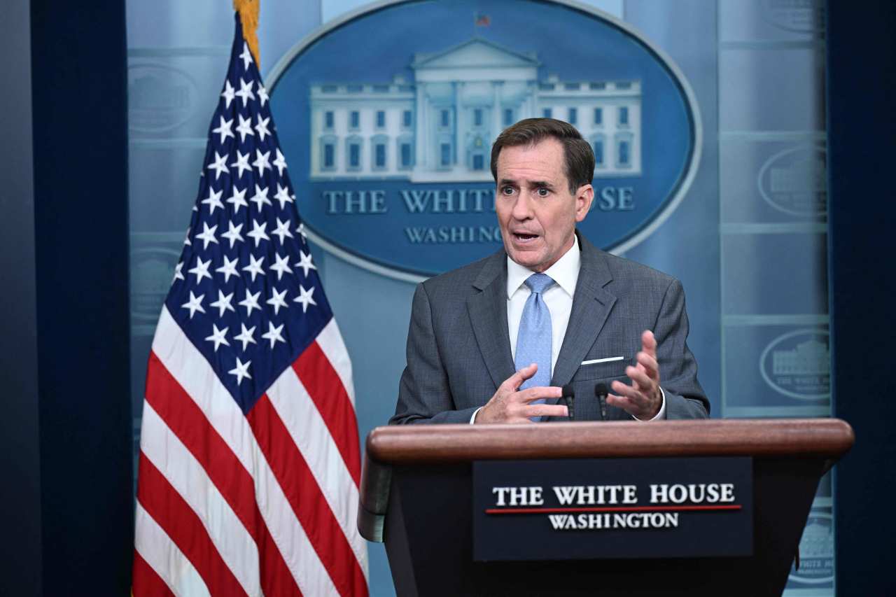 National Security Council Coordinator for Strategic Communications John Kirby speaks during the daily briefing in the Brady Press Briefing Room of the White House in Washington, DC, on October 12, 2023. (AFP-Yonhap)
