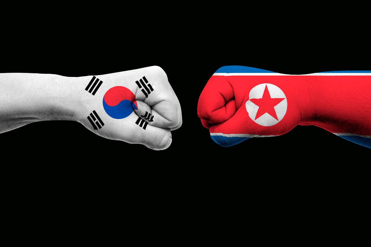 South Korean (left) and North Korean flags. (123rf)