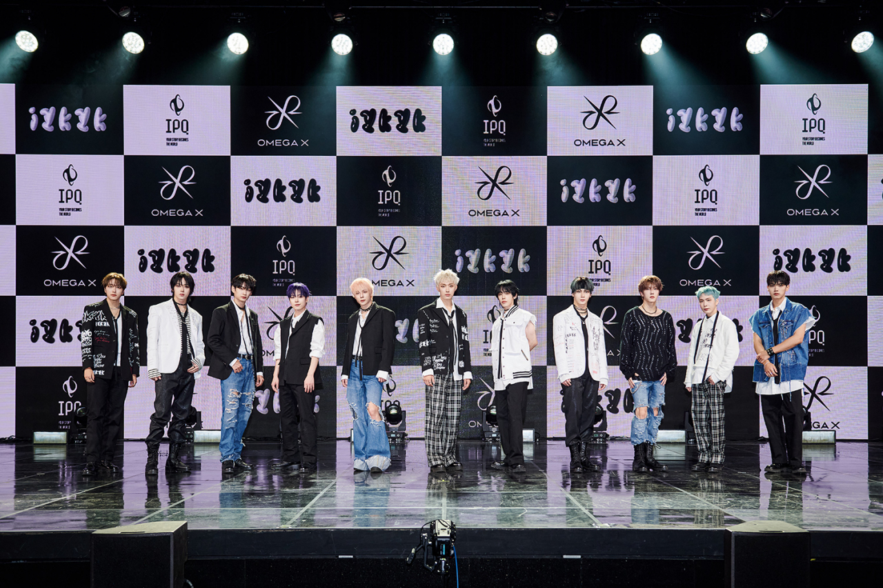 Members of Omega X pose for picture during a press conference for the band's third EP, "iykyk," in Seoul, Tuesday. (IPQ)