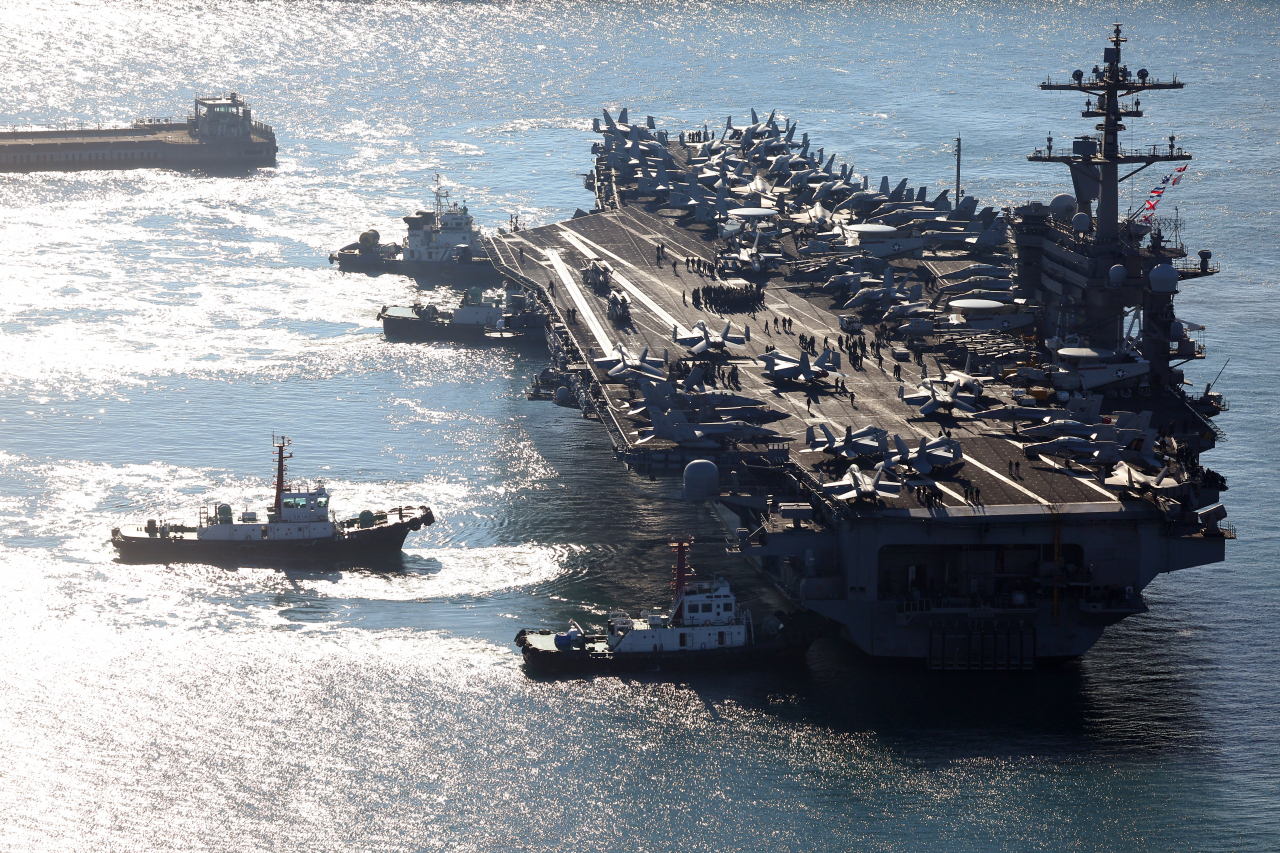 The USS Carl Vinson aircraft carrier arrives at a naval base in Busan, 320 kilometers southeast of Seoul, on Tuesday. (Yonhap)